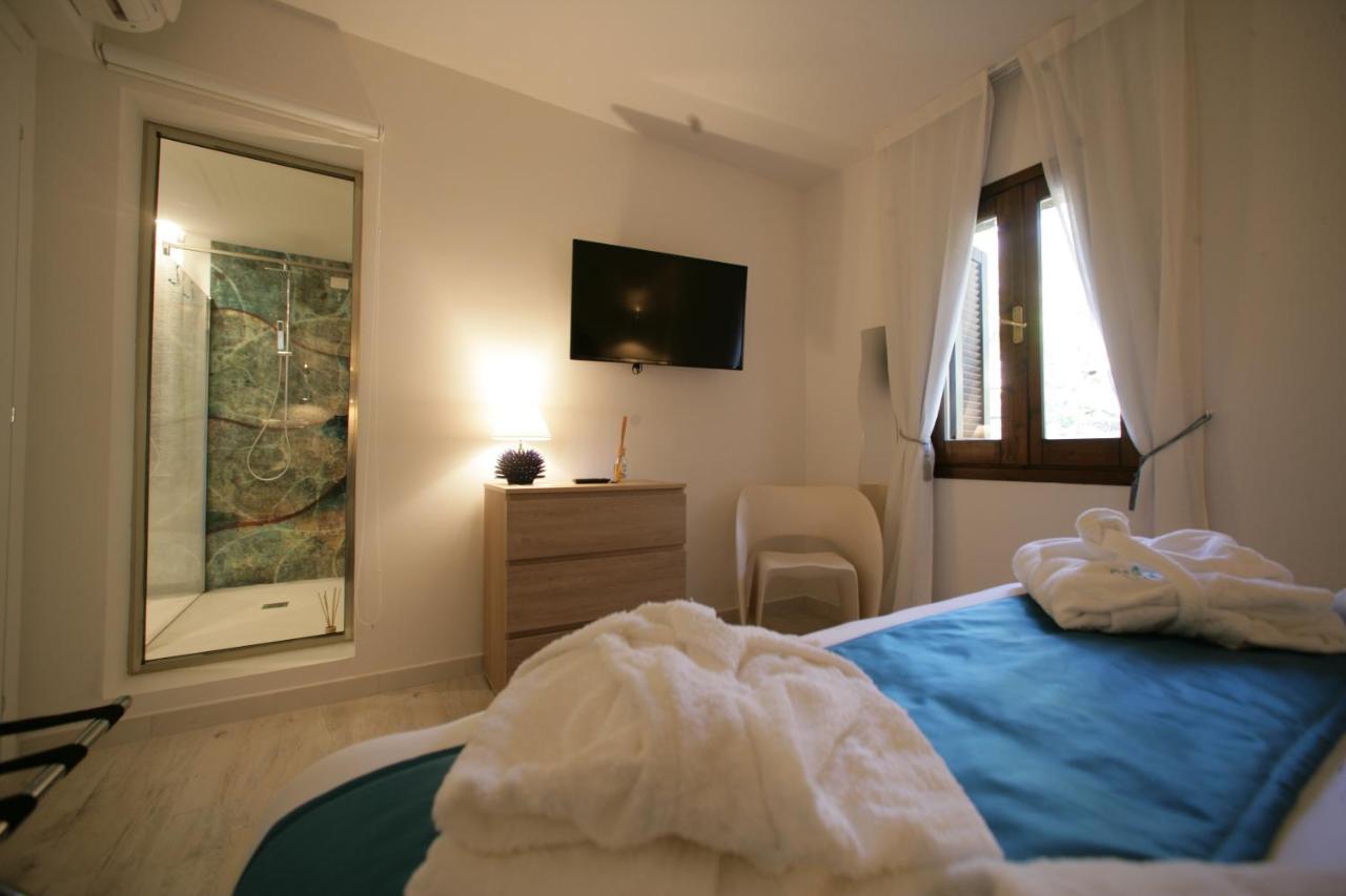 Geco Di Giada Art Suites - Adult Only Порто Ротондо Екстериор снимка